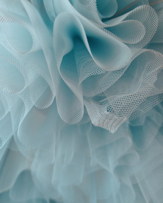 Detail photo tulle fabric light blue. Callisto Dancewear