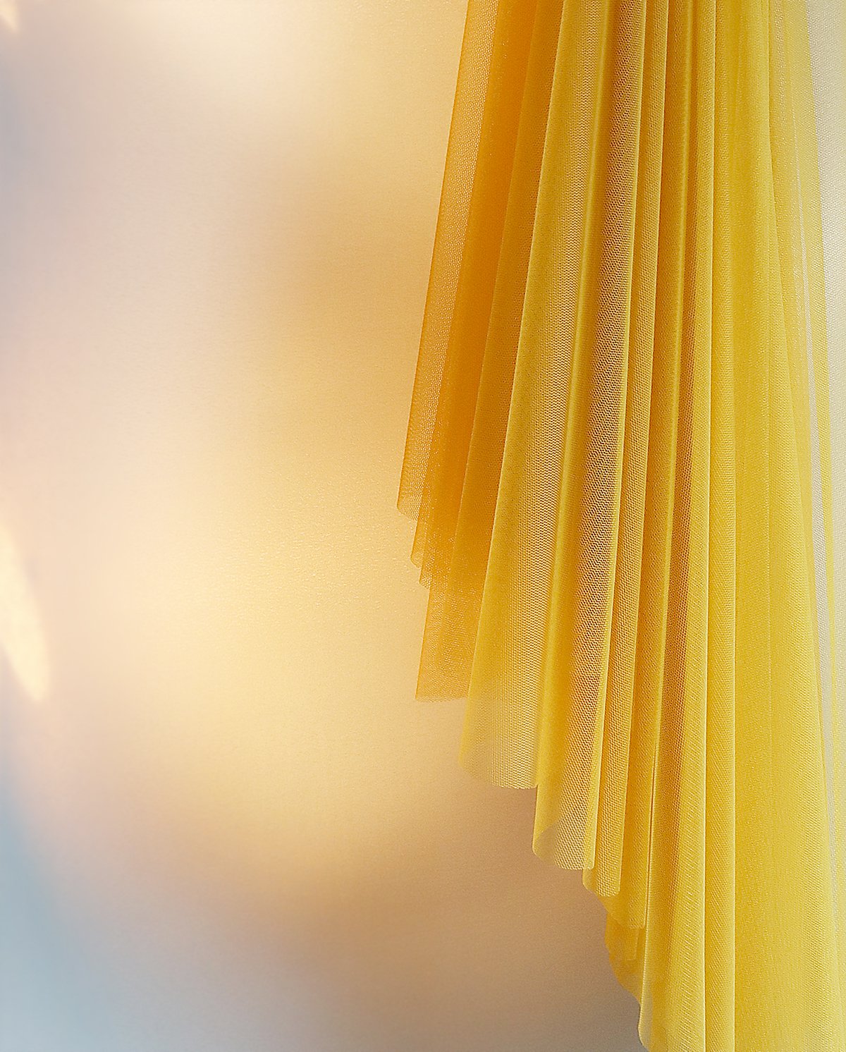 close-up ochre tulle fabric for studio ballet skirt