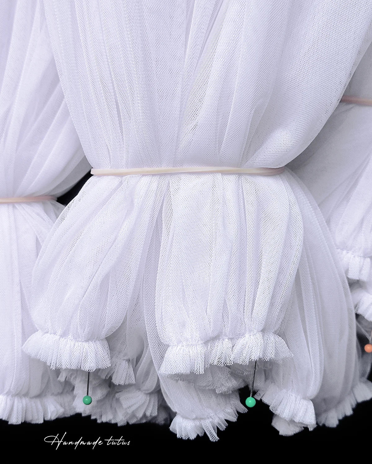Close-up tulle fabric for ballerina tutu. Color dance skirt white. Costume making