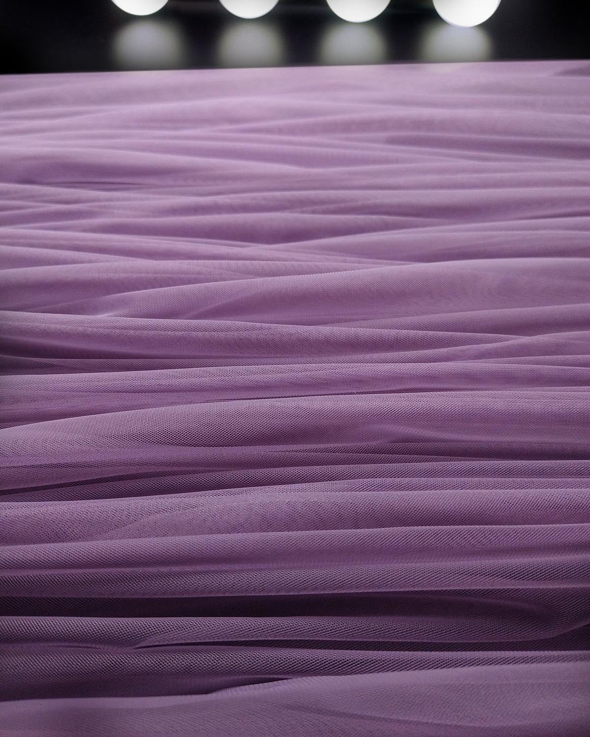 Close-up tulle fabric for tutu. Color dark-lilac